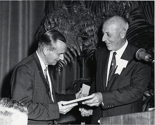H.P. Jenkins (left) Accepting the 1959 Distinguished Service Award from ACS President Newell W. Philpott