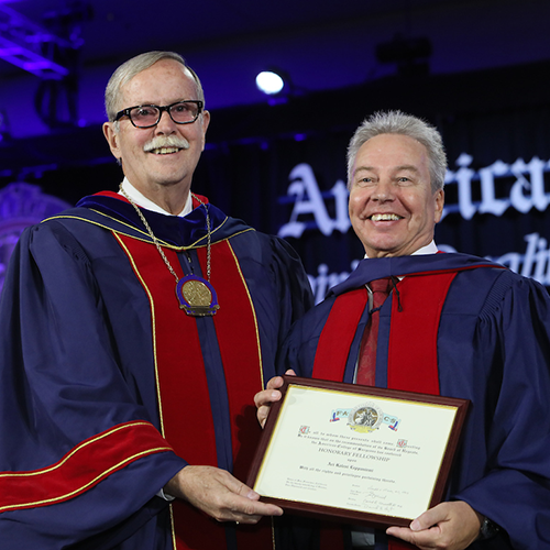 Dr. Ronald V. Maier (left) presents Prof. Ari Kalevi Leppäniemi with Honorary Fellowship in the ACS.