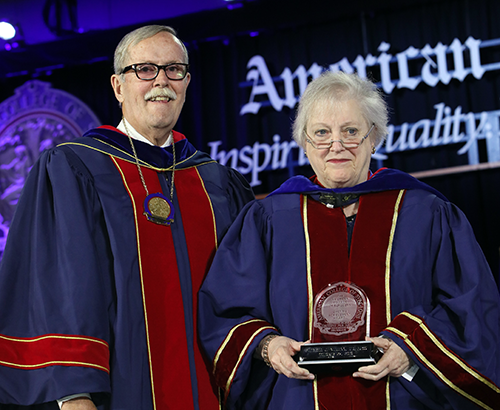 Dr. Maier (left) presents Dr. Numann with the ACS Lifetime Achievement Award