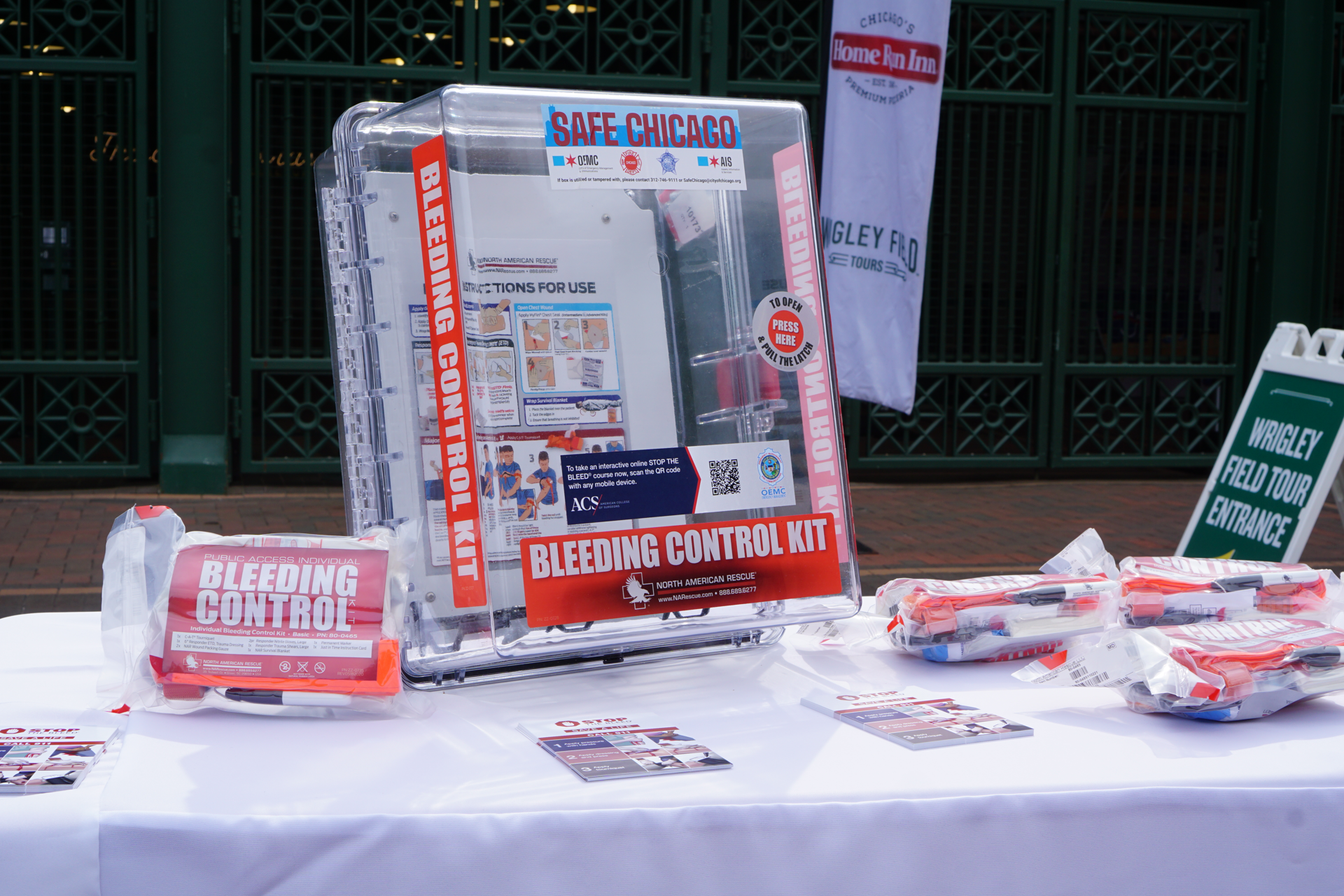 Contents of a STOP THE BLEED® kit on display in Gallagher Way near Wrigley Field.