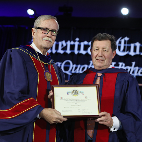 Dr. Ronald V. Maier (left) presents Prof. John Hyland with Honorary Fellowship in the ACS.