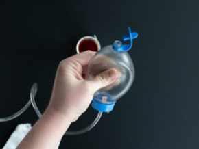 Squeeze the drain and replace the cap.