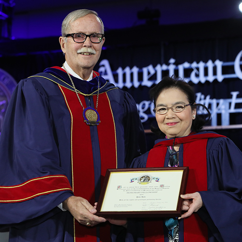 Dr. Ronald V. Maier (left) presents Prof. Yoko Kato with Honorary Fellowship in the ACS.