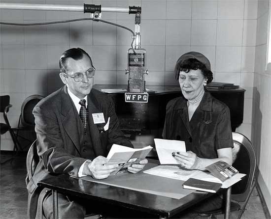 Photograph of Edward G Sandrock being interviewd by Hazel Hartman, Atlantic City radio station WFPG