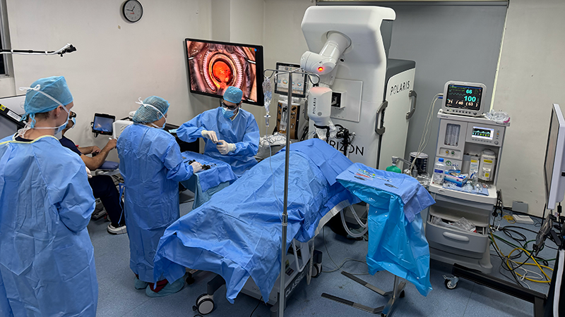 Fellow Performs World-First Robotic-Assisted Cataract Surgery