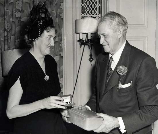 Eleanor K. Grimm and Malcolm MacEachern, at his retirement as Director of the College, 1950