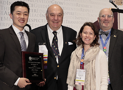 Richard A. Lynn, MD FACS (second from left), Chair of the 2019 History of Surgery Poster Competition, with first place winners (from left) Tom Liu, Katherine Howe, MD, and Michael Nussbaum, MD FACS