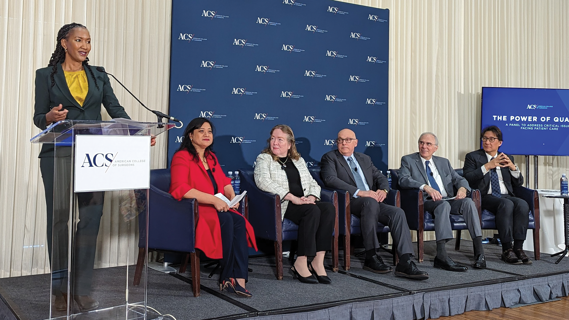 Dr. Turner (at podium) leads “The Power of Quality” Campaign launch panel.