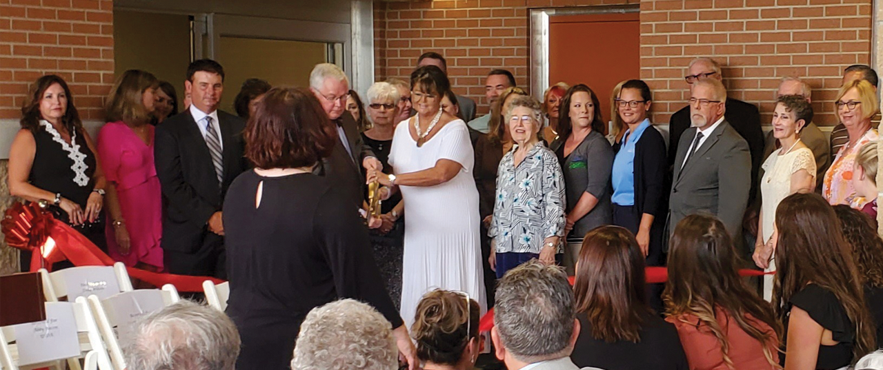 Dr. Molt and Bunting-Williams at the Surgical Pavilion ribbon-cutting ceremony