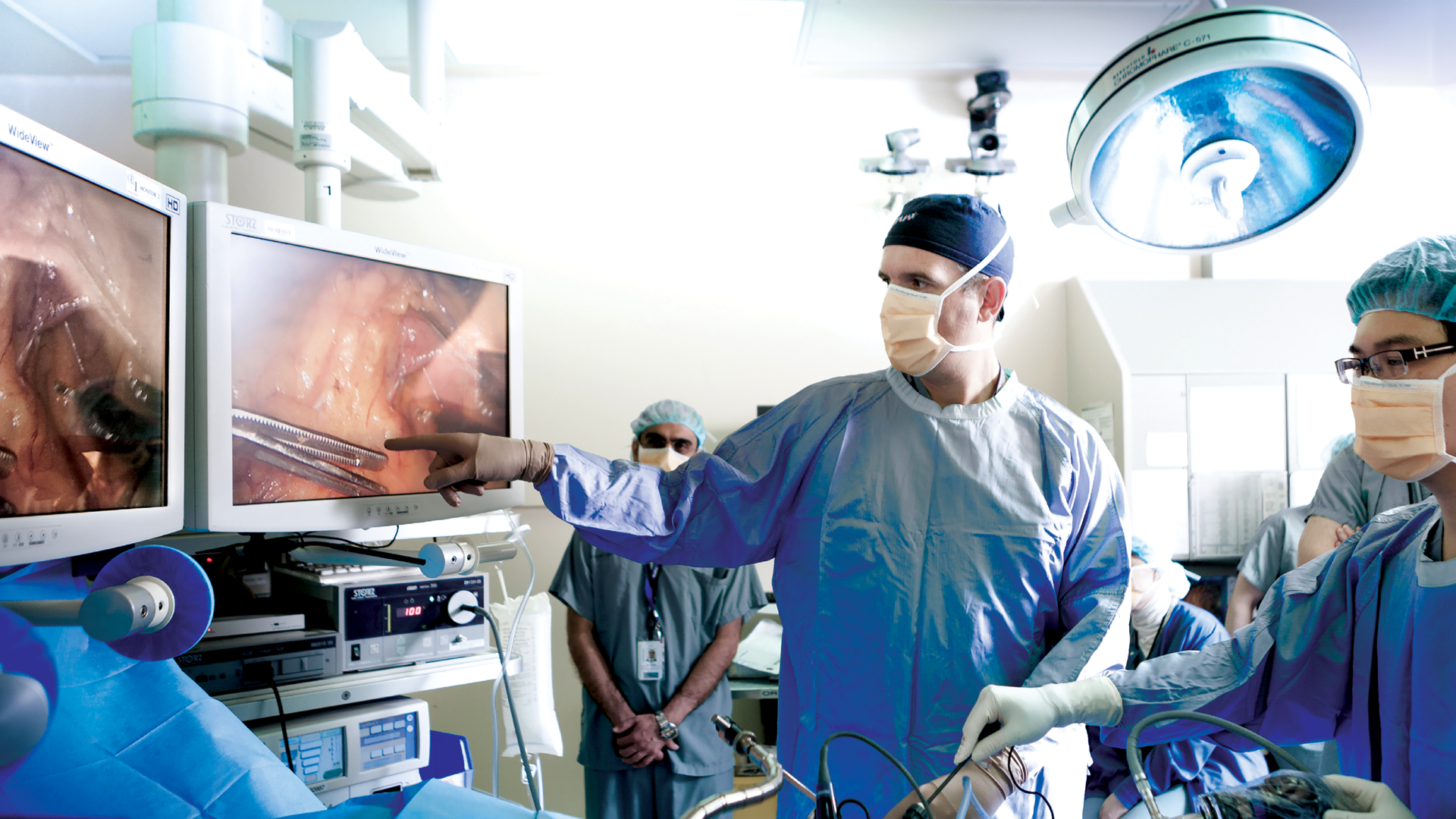 A specialized camera behind Dr. Grantcharov captures video and audio data. The output has all faces blurred to de-identify patients and the surgical team. (Photo by Yuri Makarov)
