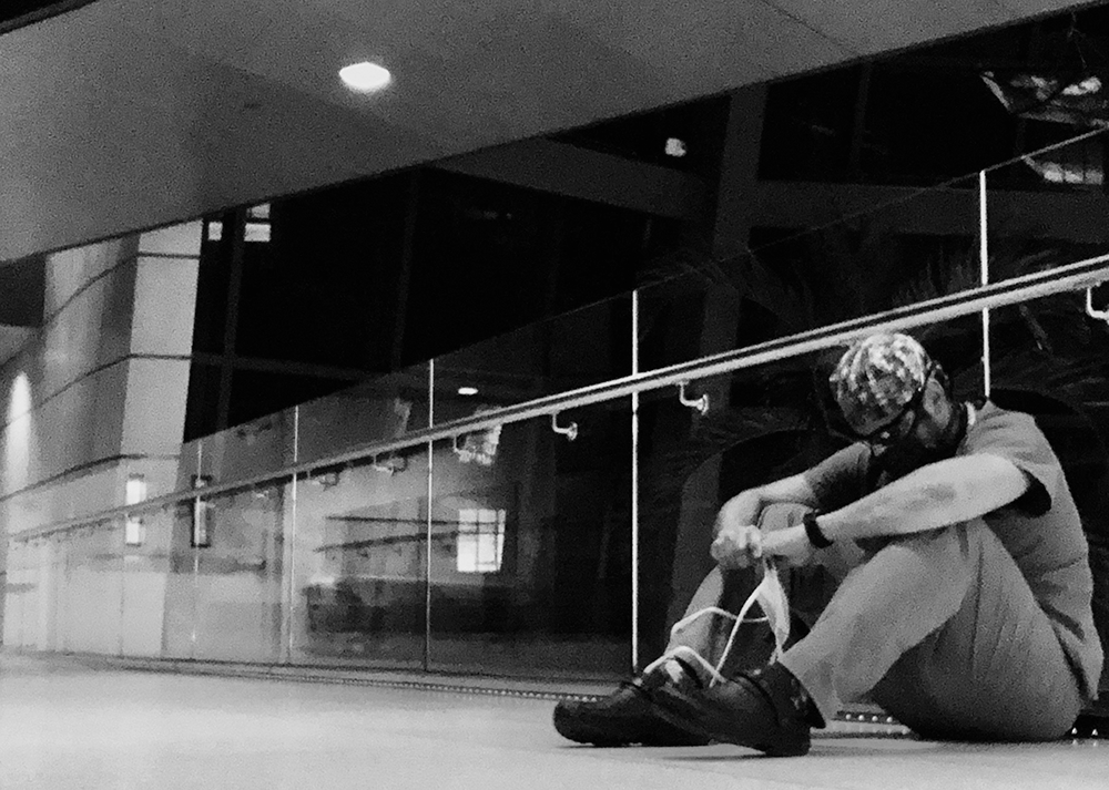 Photo: The author outside his hospital, taking a break from treating COVID-19 patients (photo by Jason D’Cruz, surgery intern, Mount Sinai-South Nassau)