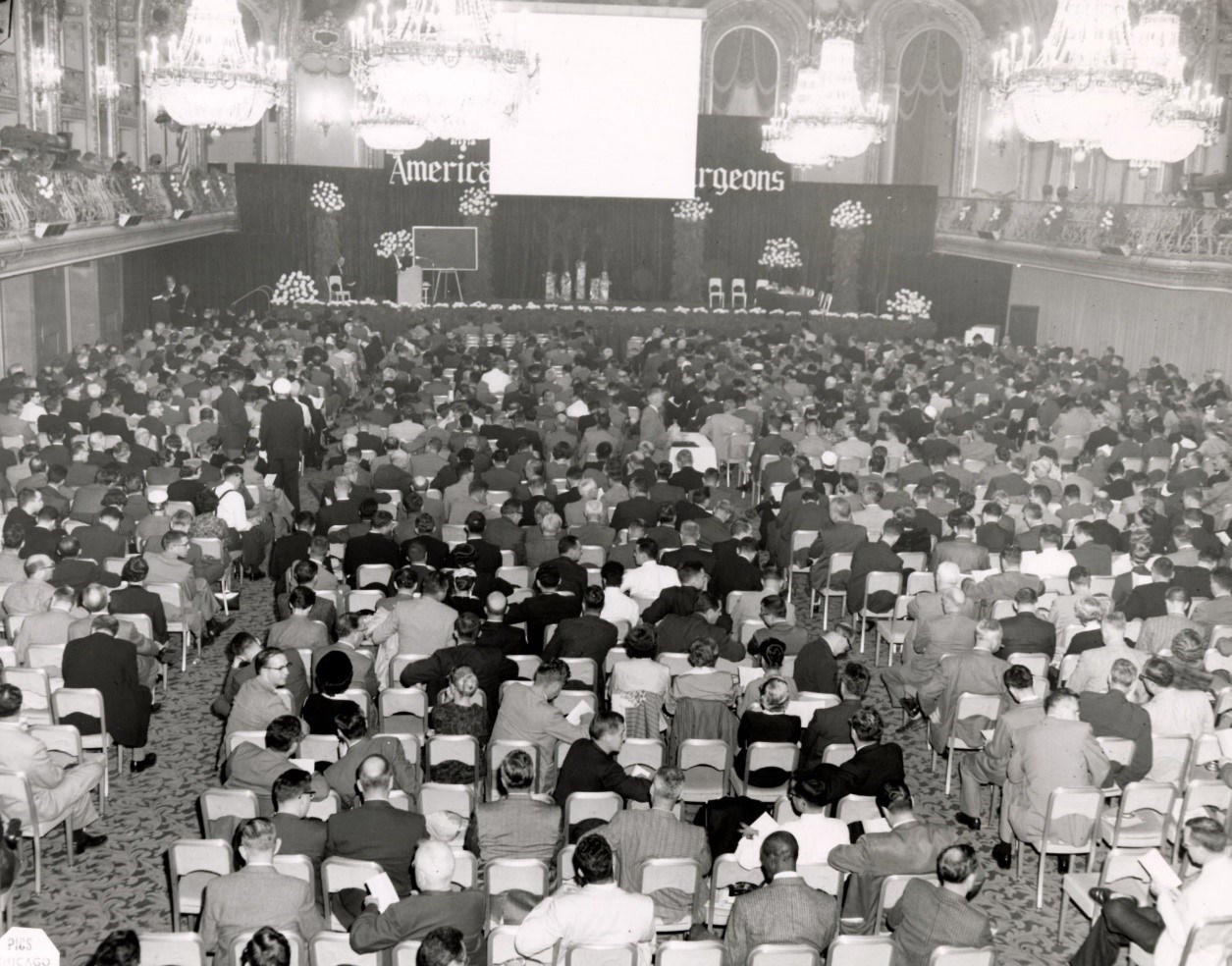 1958 Clinical Congress attendees waiting for a Cine Clinic motion picture to start. Photo courtesy of ACS Archives.