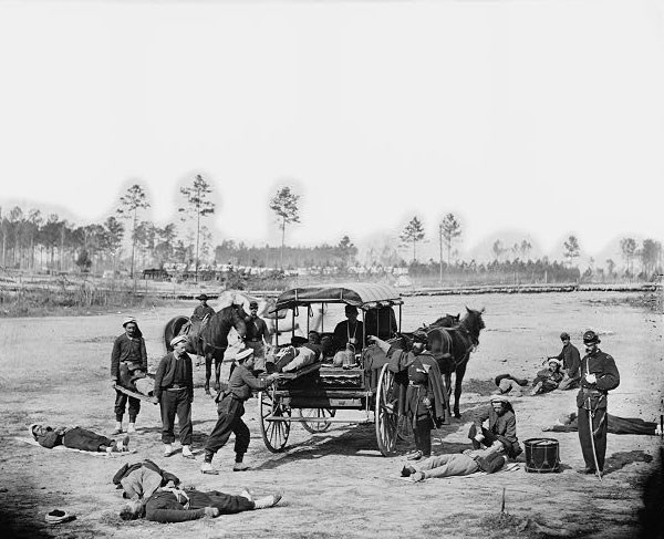 Civil War ambulance crew demonstrating removal of injured soldiers from the field. Library of Congress, Prints & Photographs Division, Civil War Photographs, reproduction number, LC-DIG-cwpb-03950.