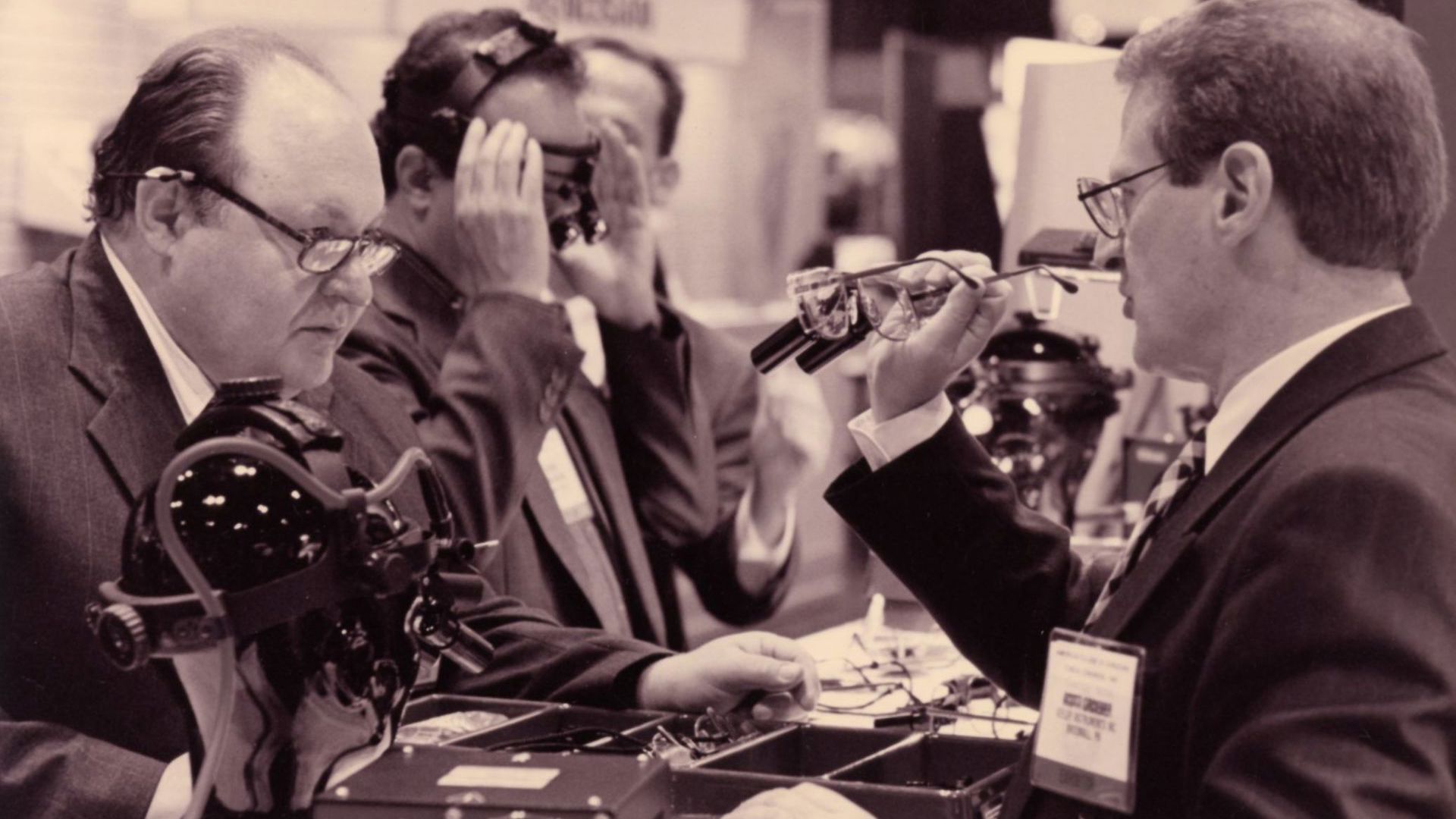 attendees-trying-on-surgical-glasses.jpg