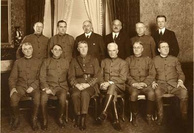 Prominent Surgeons Involved in the War Effort (1917) Seated: William J. Mayo, Charles H. Mayo, Sir Berkeley Moynihan, Franklin H. Martin, George W. Crile, and A.J. Ochsner.  Standing: Fred B. Lund, Raymond P. Sullivan, Frederic J. Cotton, J.G. Clark, F.F. Simpson, John G. Bowman.