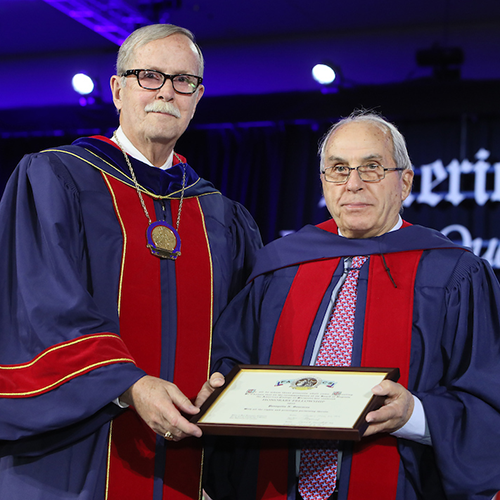 Dr. Ronald V. Maier (left) presents Prof. Panayotis Soucacos with Honorary Fellowship in the ACS.