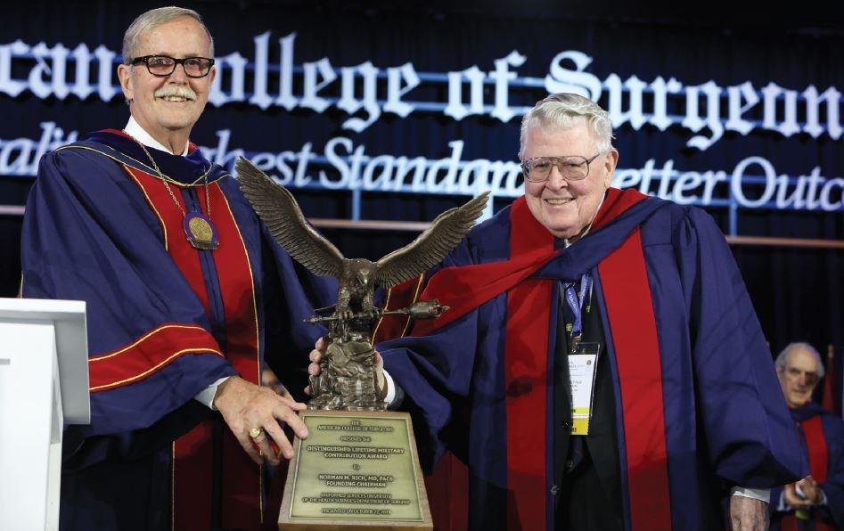 Dr. Rich receiving the First Annual ACS Distinguished Military Lifetime Achievement Award at the 2019 ACS Convocation, conferred upon him by then-ACS President Ronald V. Maier, MD, FACS, FRCS(Hon), FCSHK(Hon)