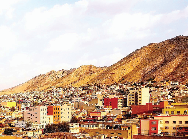 Dohuk, pictured against mountains in northern Iraq-Kurdistan