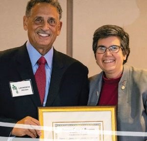 Scudder Orator Dr. Lenworth Jacobs (left) with Immediate Past-COT Chair Eileen Bulger, MD, FACS