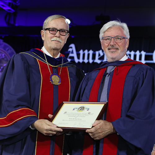 Dr. Ronald V. Maier (left) presents Prof. Antonio M. de Lacy Fortuny with Honorary Fellowship in the ACS.