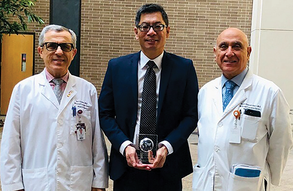 From left: Award recipients Gazi Zibari, MD, FACS, 2019 awardee; Dr. Chu; and M. Hosein Shokouh-Amiri, MD, FACS, 2017 awardee